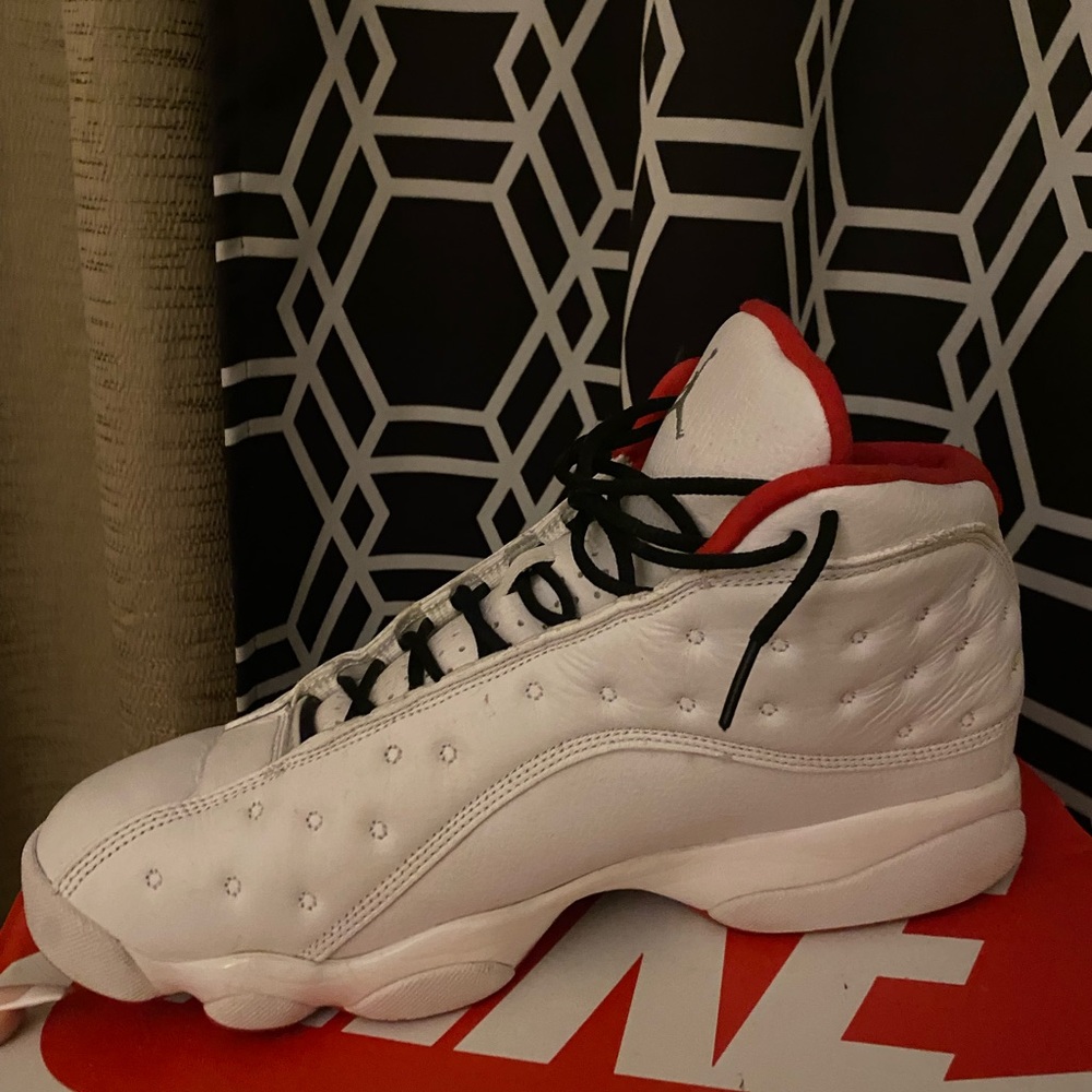 Red and white Jordan 13s